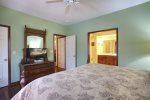 Master has dresser, tv and closet